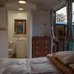 Shepherds Hut In Enclosed Field